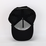 Black baseball cap with a curved brim, solid front panel, and perforated back panels, shown from the back on a white background.
