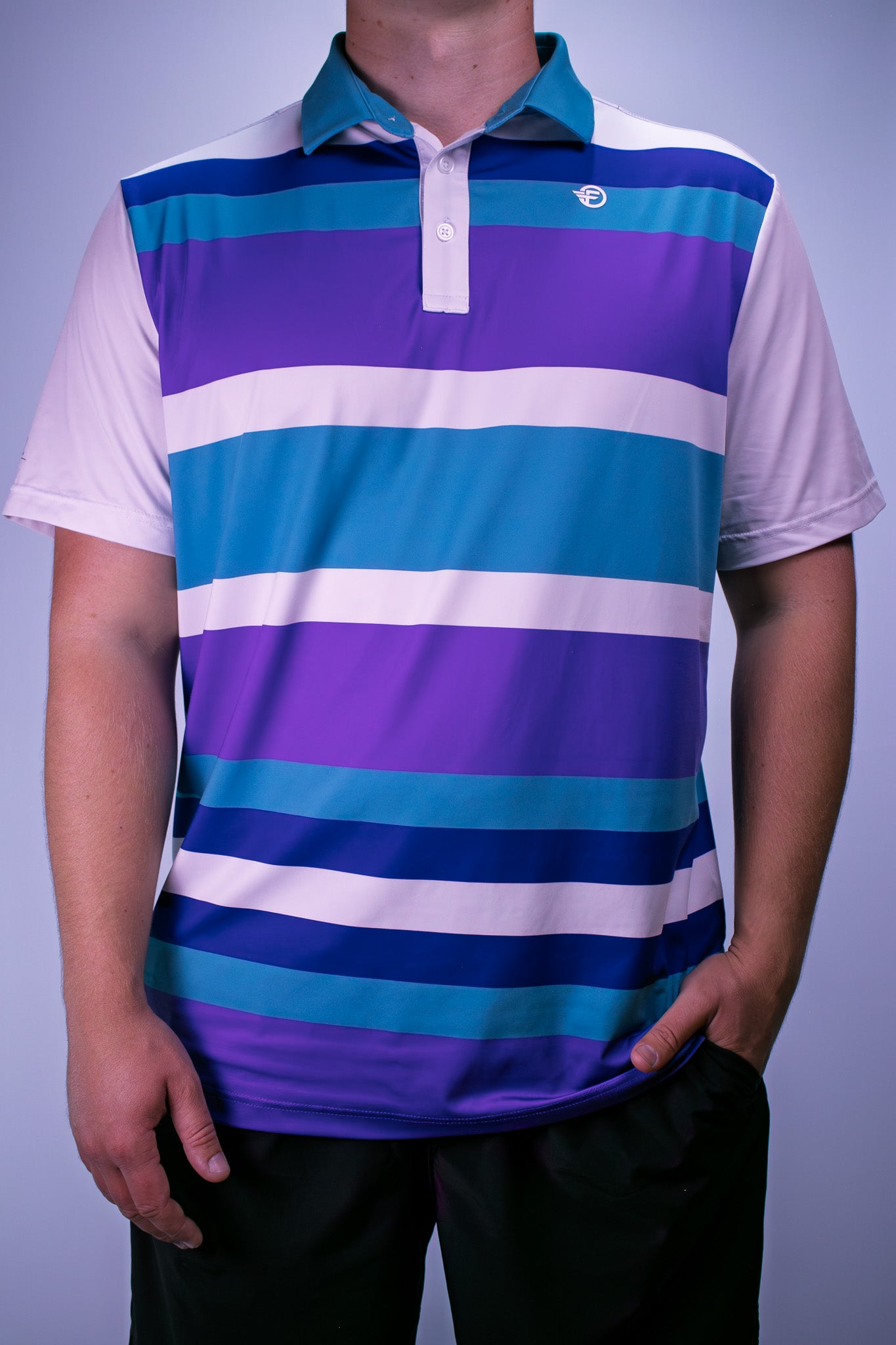 Person wearing a striped polo shirt with purple, blue, and white colors on a plain background