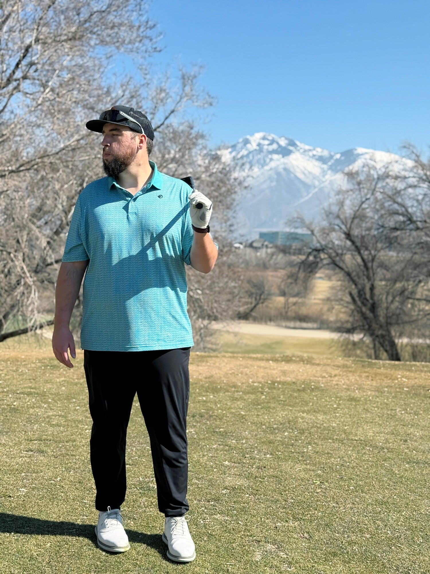 Golfer standing on tee box ready to hit