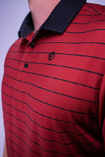 The best golf polo that is red with black stripes, gives you some sunday swagger while wearing it out on the course