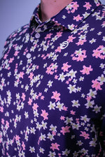 Floral patterned shirt with a brand logo on a Navy background