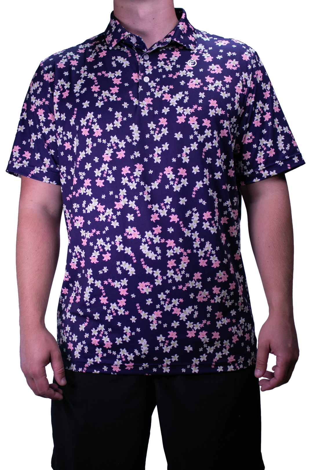 Person wearing a short-sleeve shirt with a floral pattern on a white background