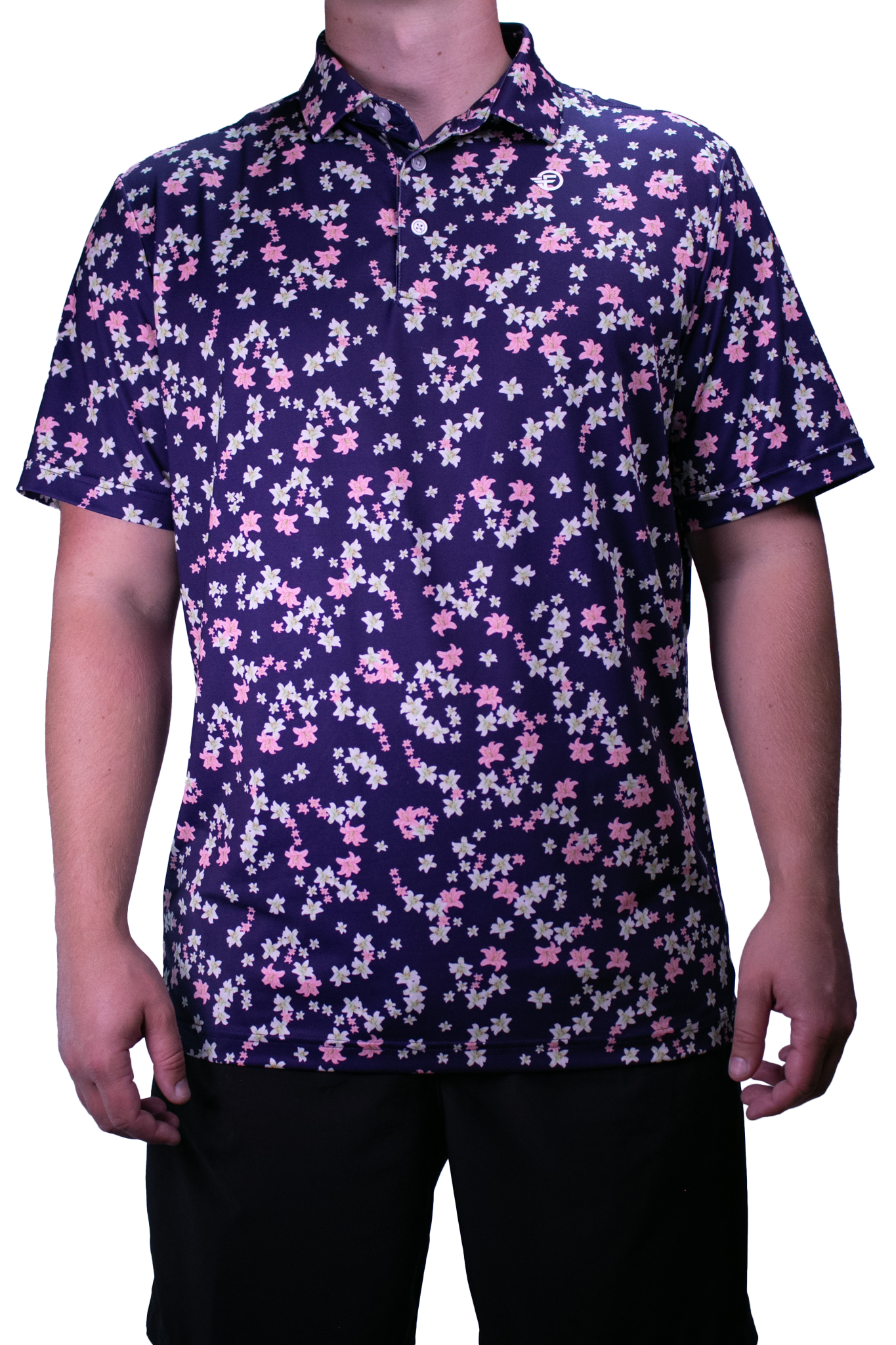 Person wearing a short-sleeve shirt with a floral pattern on a white background