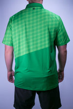 Green golf polo with gingham top and solid bottom half