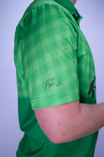 Premium green golf polo with cursive logo on sleeve. This golf polo could win you and 3 friends a free golf trip to St. George, Utah