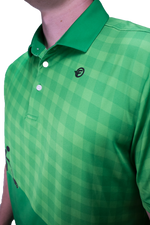 Green checkered polo shirt with a brand logo on a white background
